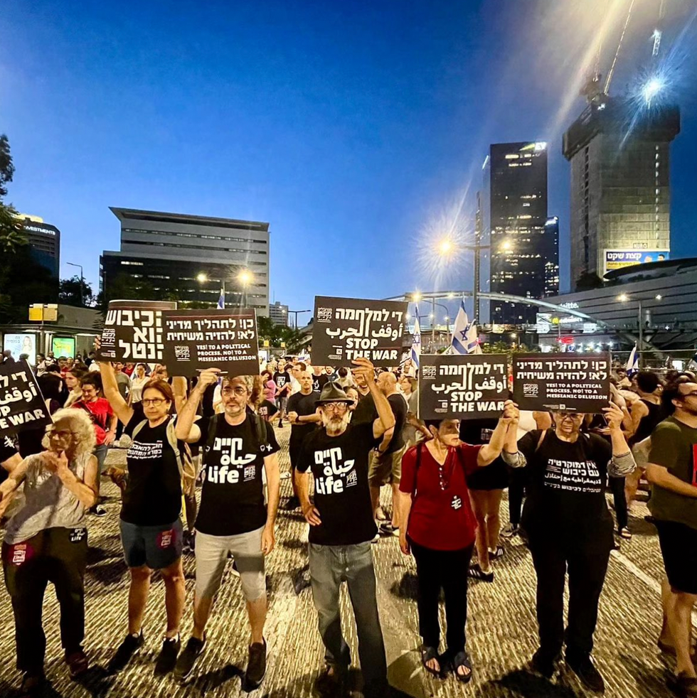 Photo of Guy Hirschfeld marching for peace