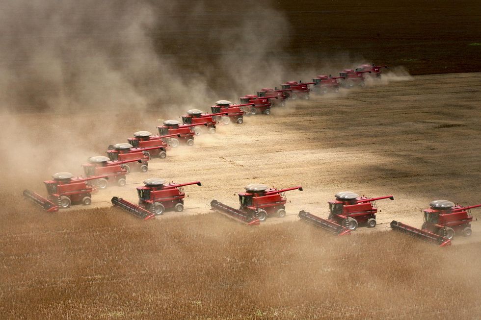 Photo of harvesters in a field in Mato Grosso, Brazil.