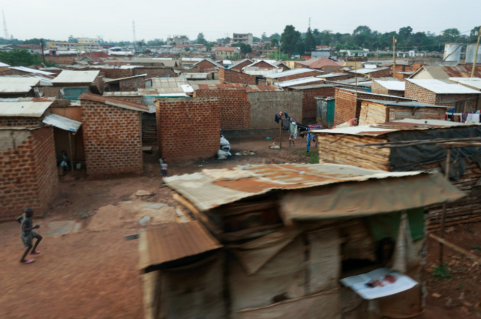 Photo of houses and kiosks built on Uganda Railways Corporation land in Kireka, a township in Kampala, close to the company's railway lines.