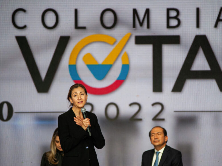 Photo of Ingrid Betancourt speaking in a microphone during the first presidential candidates debate in Bogota, Colombia on Jan. 25