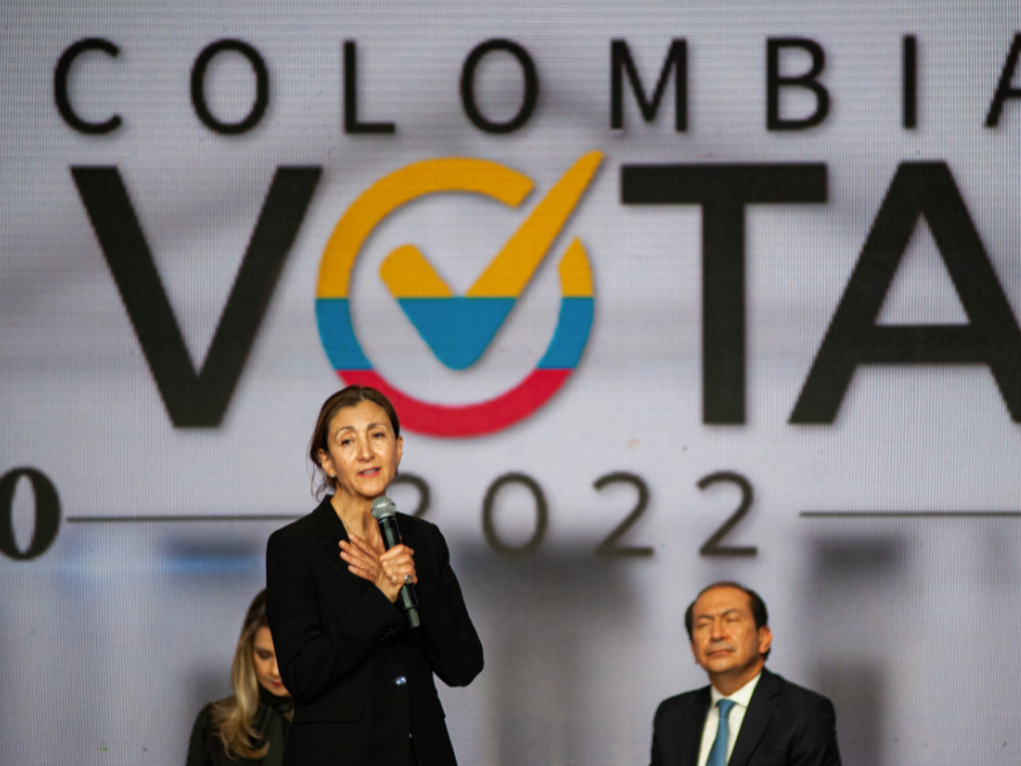 Photo of Ingrid Betancourt speaking in a microphone during the first presidential candidates debate in Bogota, Colombia on Jan. 25