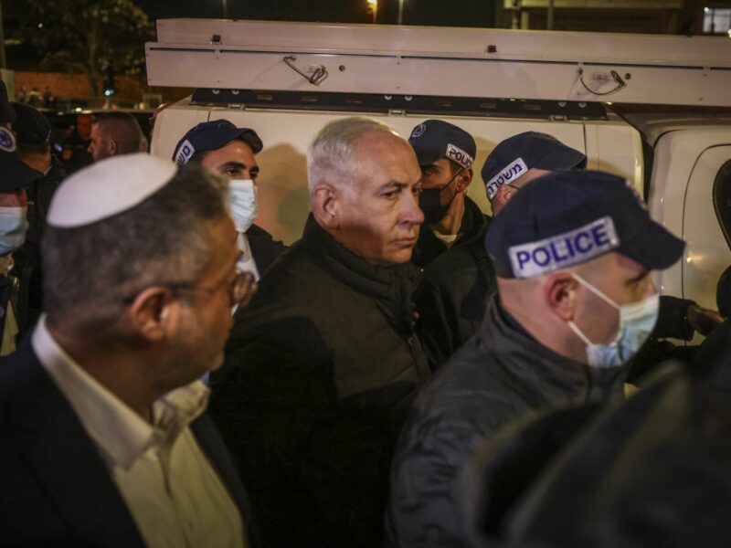Photo of Israeli Prime Minister Benjamin Netanyahu arriving at the site of a shooting attack near a synagogue in East Jerusalem.