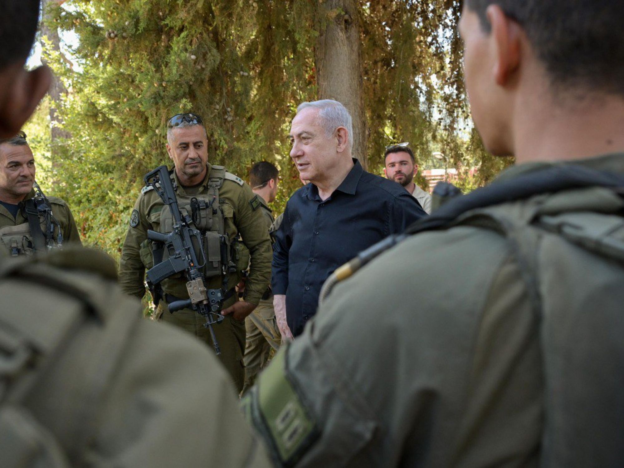 Photo of Israeli Prime Minister Benjamin Netanyahu meeting with IDF troops while touring Israel's northern border with Lebanon in late August.
