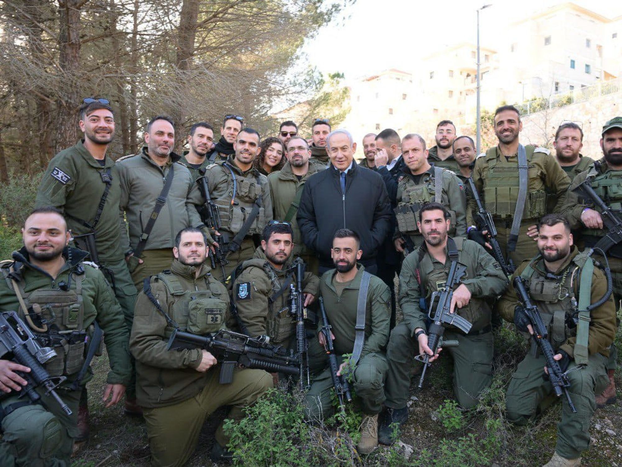 Photo of Israeli Prime Minister Benjamin Netanyahu meeting with reserve soldiers and commanders of the IDF Judea and Samaria Division, 43rd Battalion, in the Binyamin Brigade, in the community of Eli.