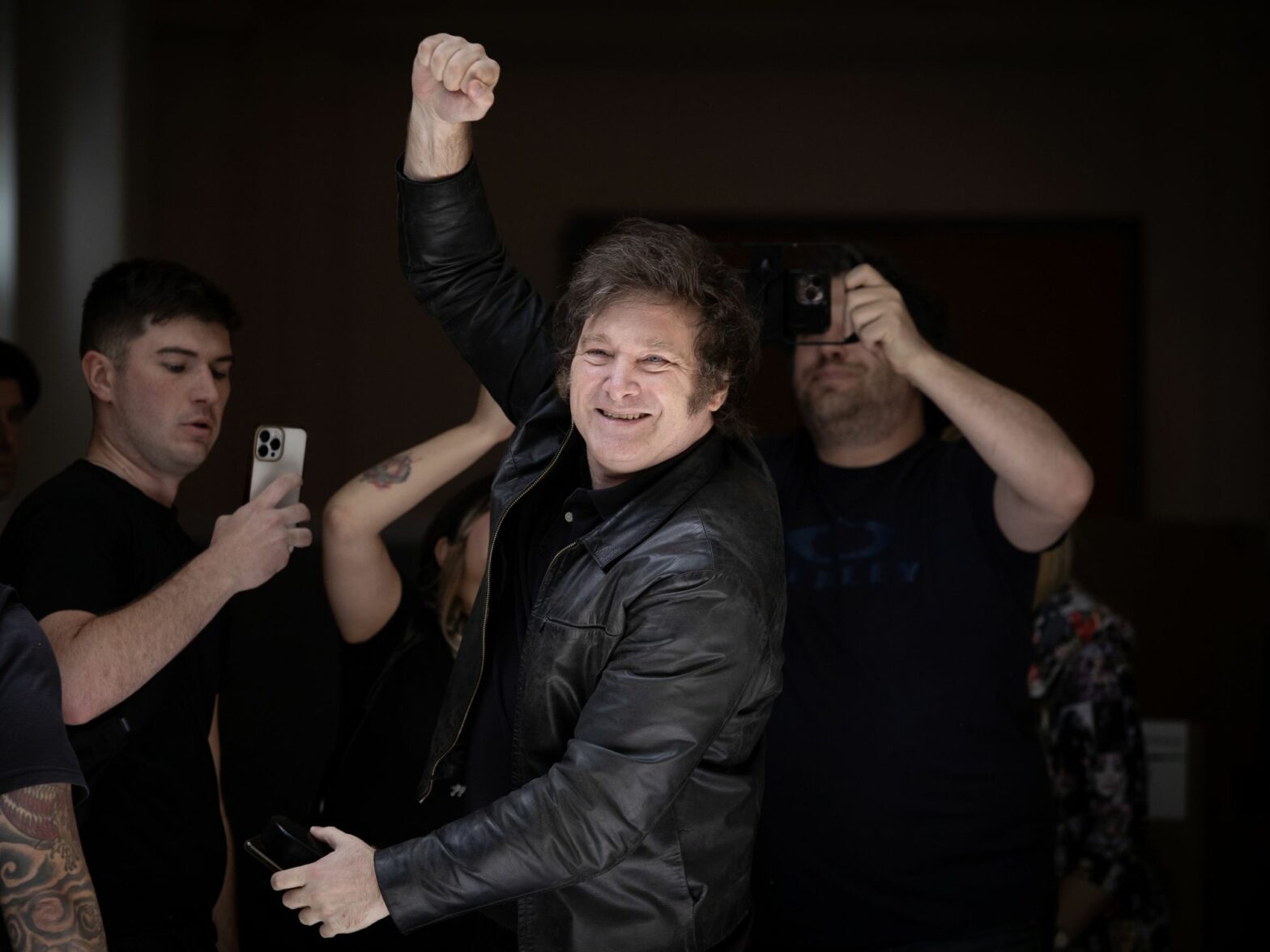 photo of javier milei holding up his fist