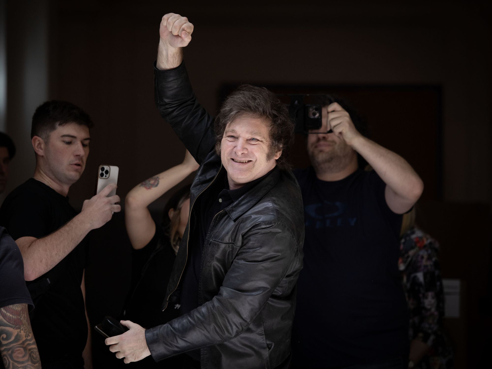 photo of javier milei holding up his fist