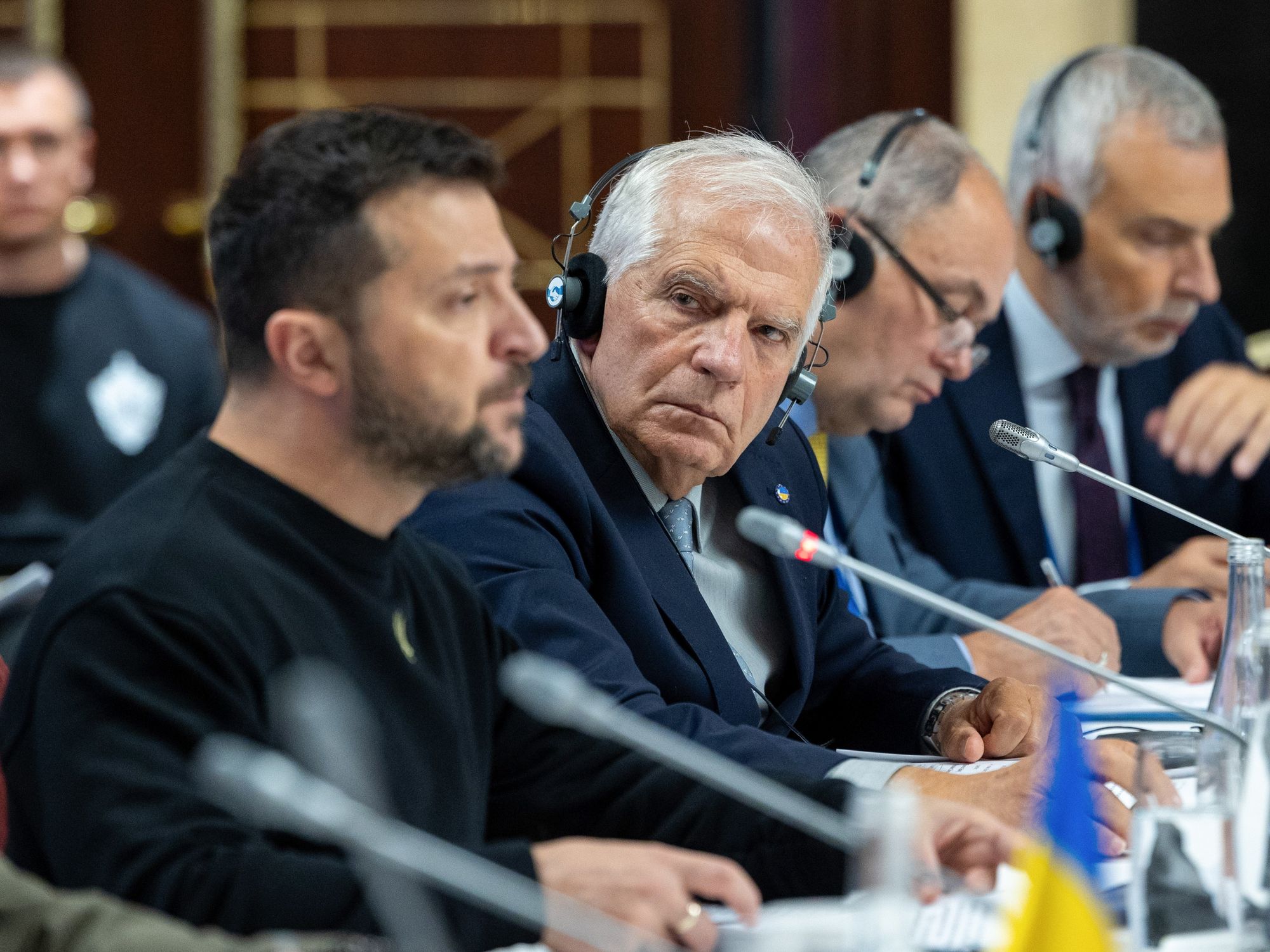 photo of Josep Borrell listening to Zelensky speak