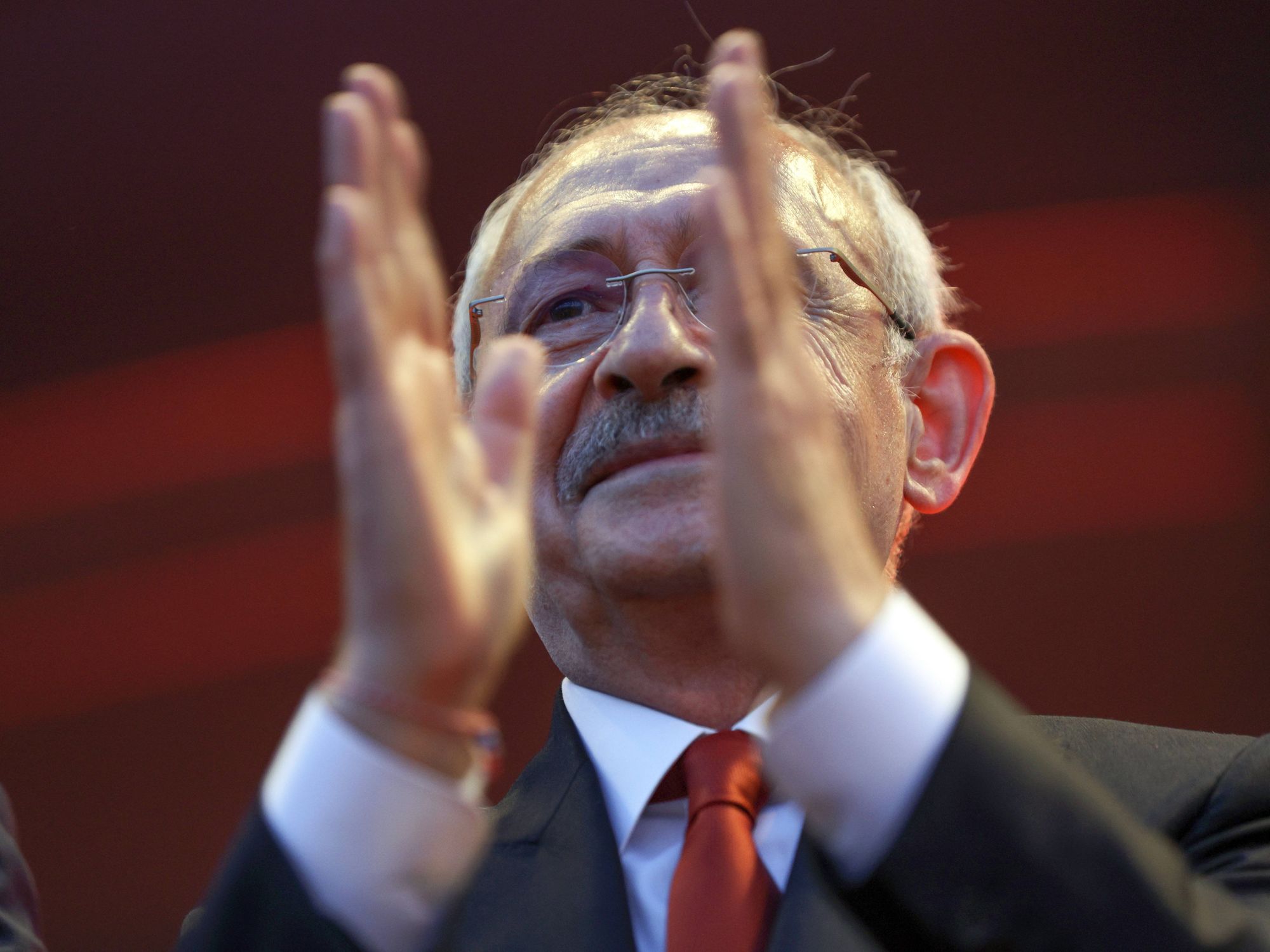 Photo of Kemal Kilicdaroglu applauding during campaign event in Antalya, Turkey, 7 May 2023.