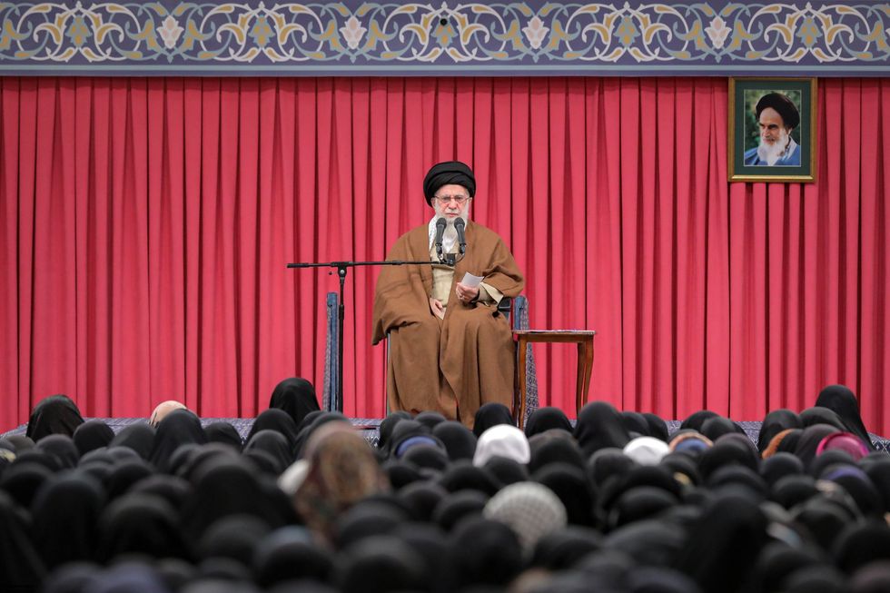 photo of khamenei speaking to a crowd.