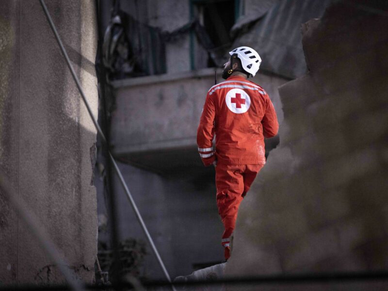 photo of lebanese red cross first responder amid rubble in beirut