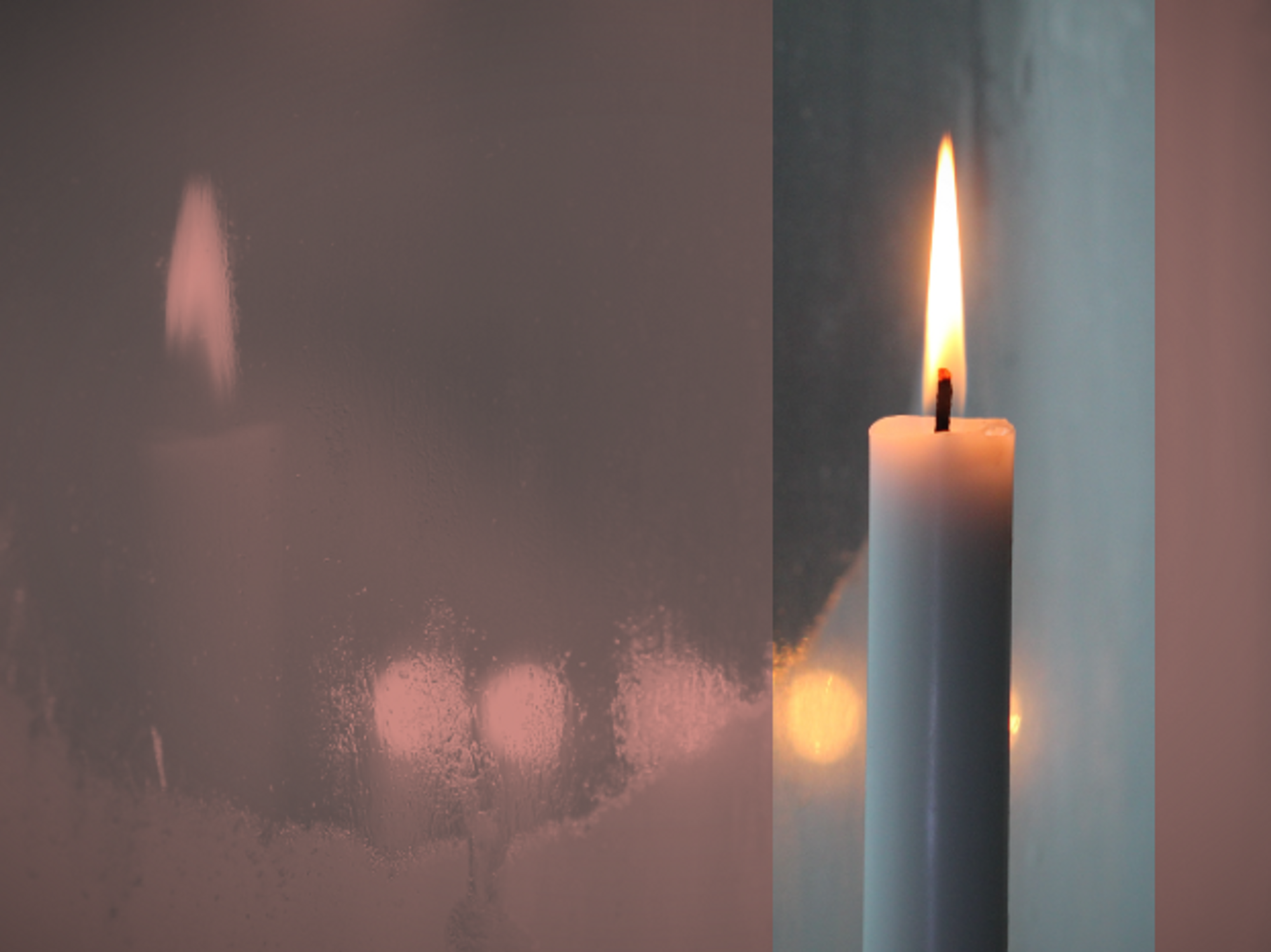 Photo of lit candle with its reflection in a window pane