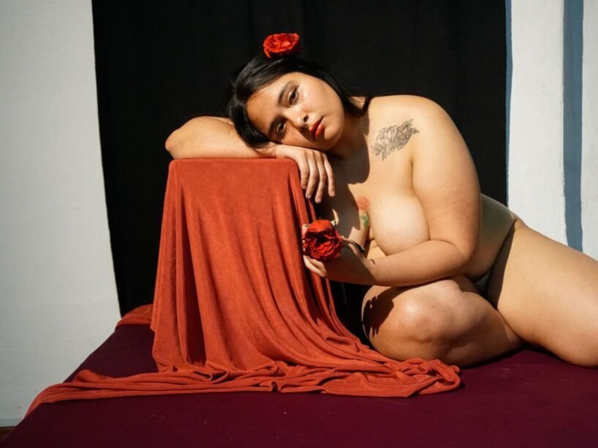 Photo of Liz posing at an art gallery in Mexico City.