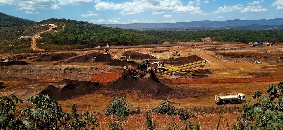 Photo of machines working at a quarry in Brumadinho, Brazil.