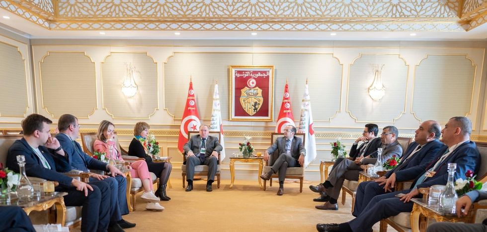 Photo of members of Tunisia's Independent High Authority for Elections welcoming a Russian delegation in Tunis ​on Dec. 16, 2022.
