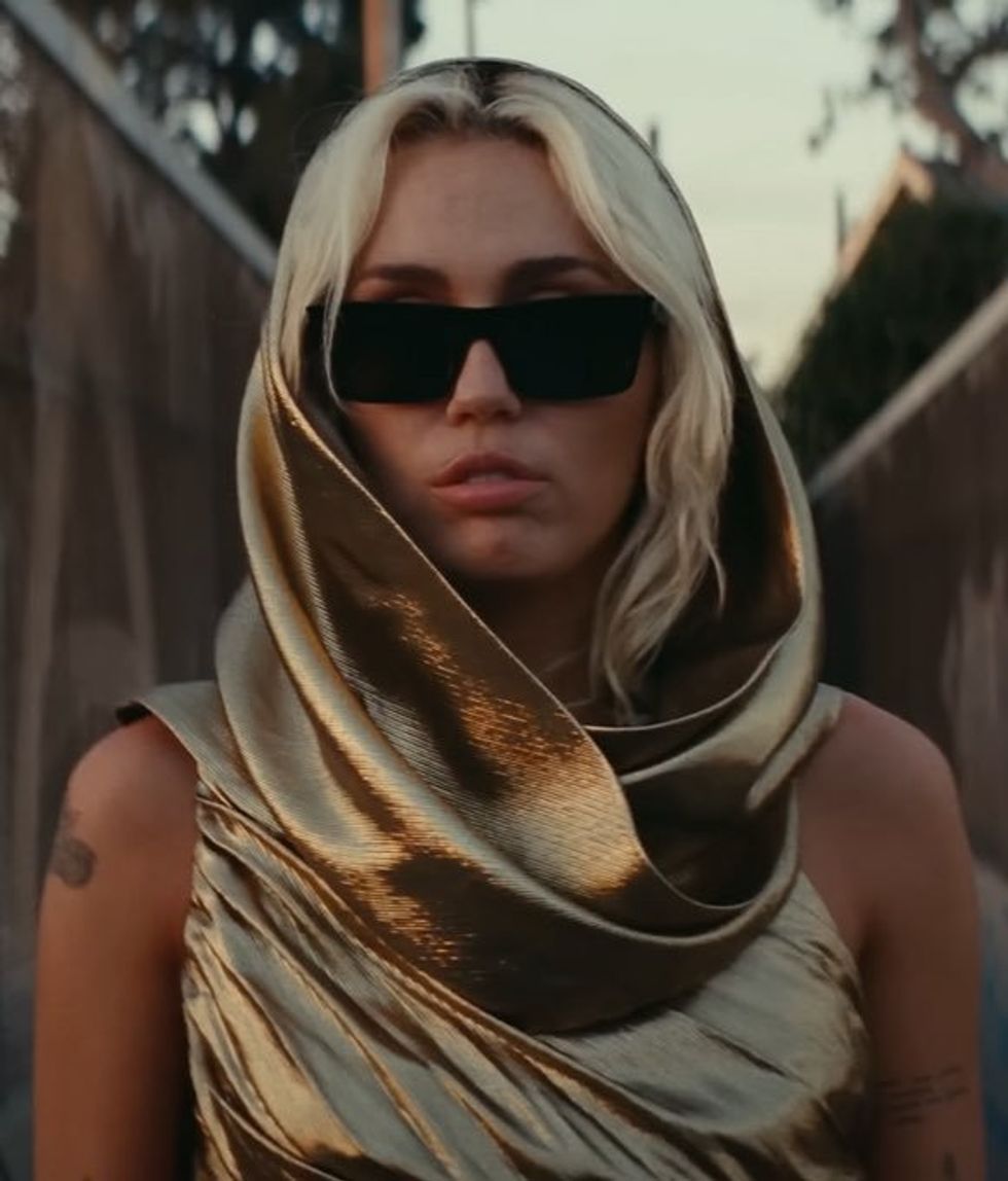 Photo of Miley Cyrus in new music video "Flowers"