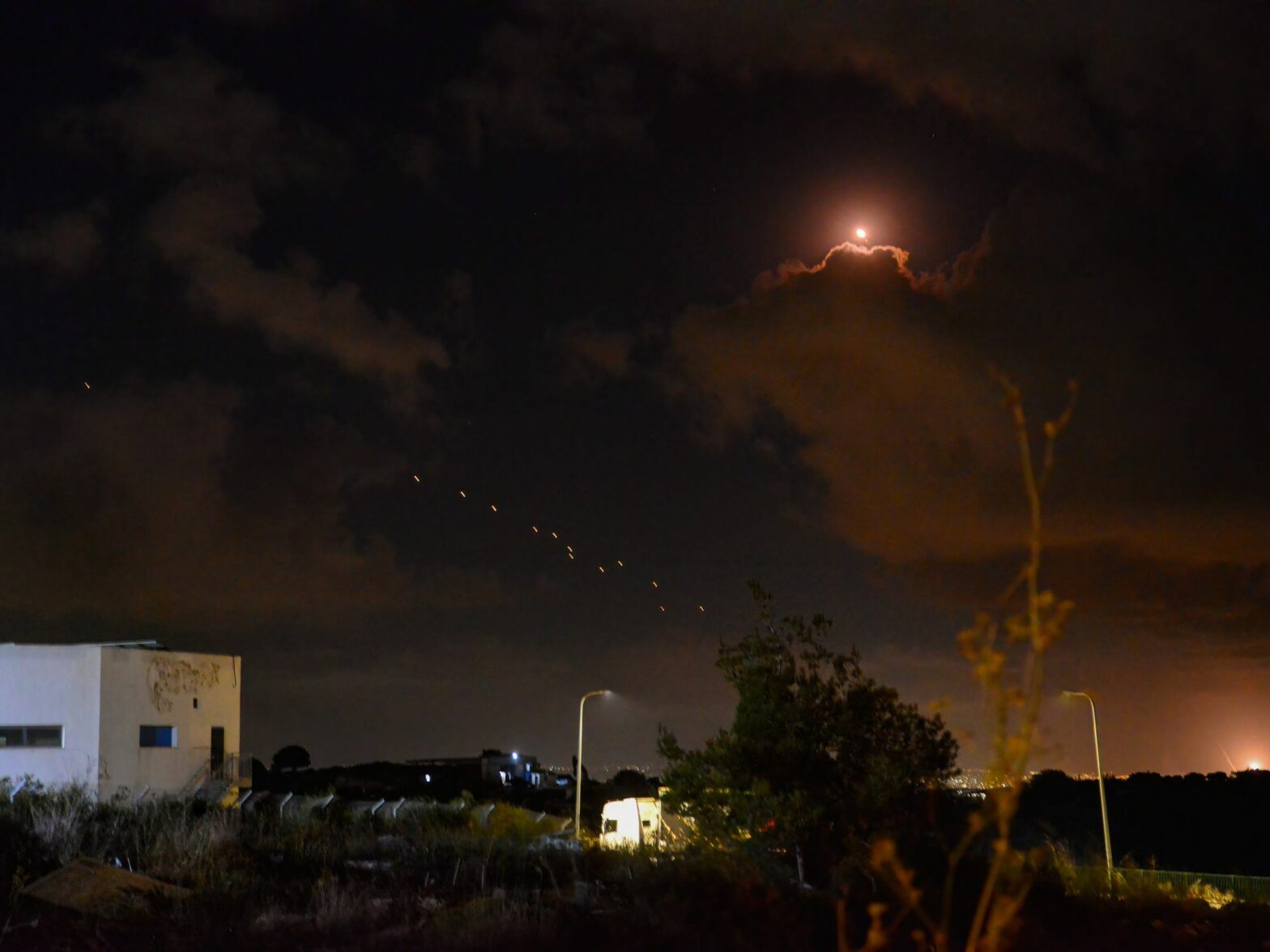 photo of missiles in night sky