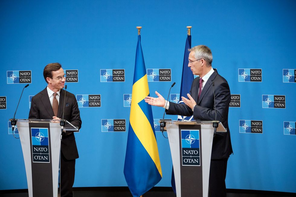 Photo of NATO Secretary General Jens Stoltenberg and the Prime Minister of Sweden, Ulf Kristersson