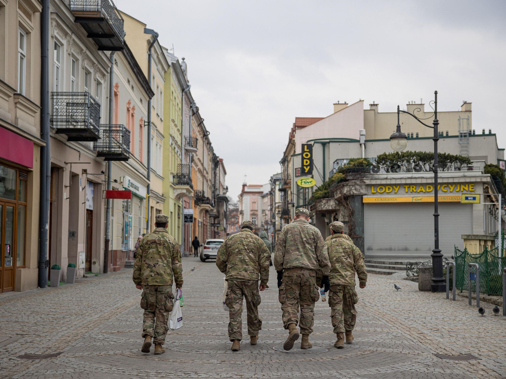 photo of nato soldiers walking away