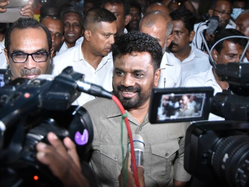 Photo of New Sri Lankan leader Anura Kumara Dissanayake speaking to TV cameras