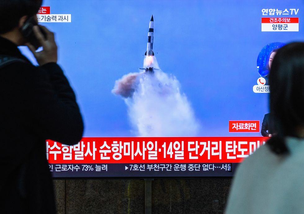 photo of North Korean missile being fired