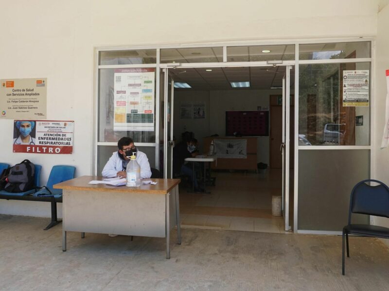 Photo of nurse OvidioDíaz Gómez waiting for people to arrive for COVID-19 vaccination at a health center in Aldama, Chiapas. Few people showed up.