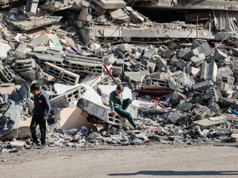 Photo of Palestinian children amid the rubble in Rafah, southern Gaza, on Dec. 19