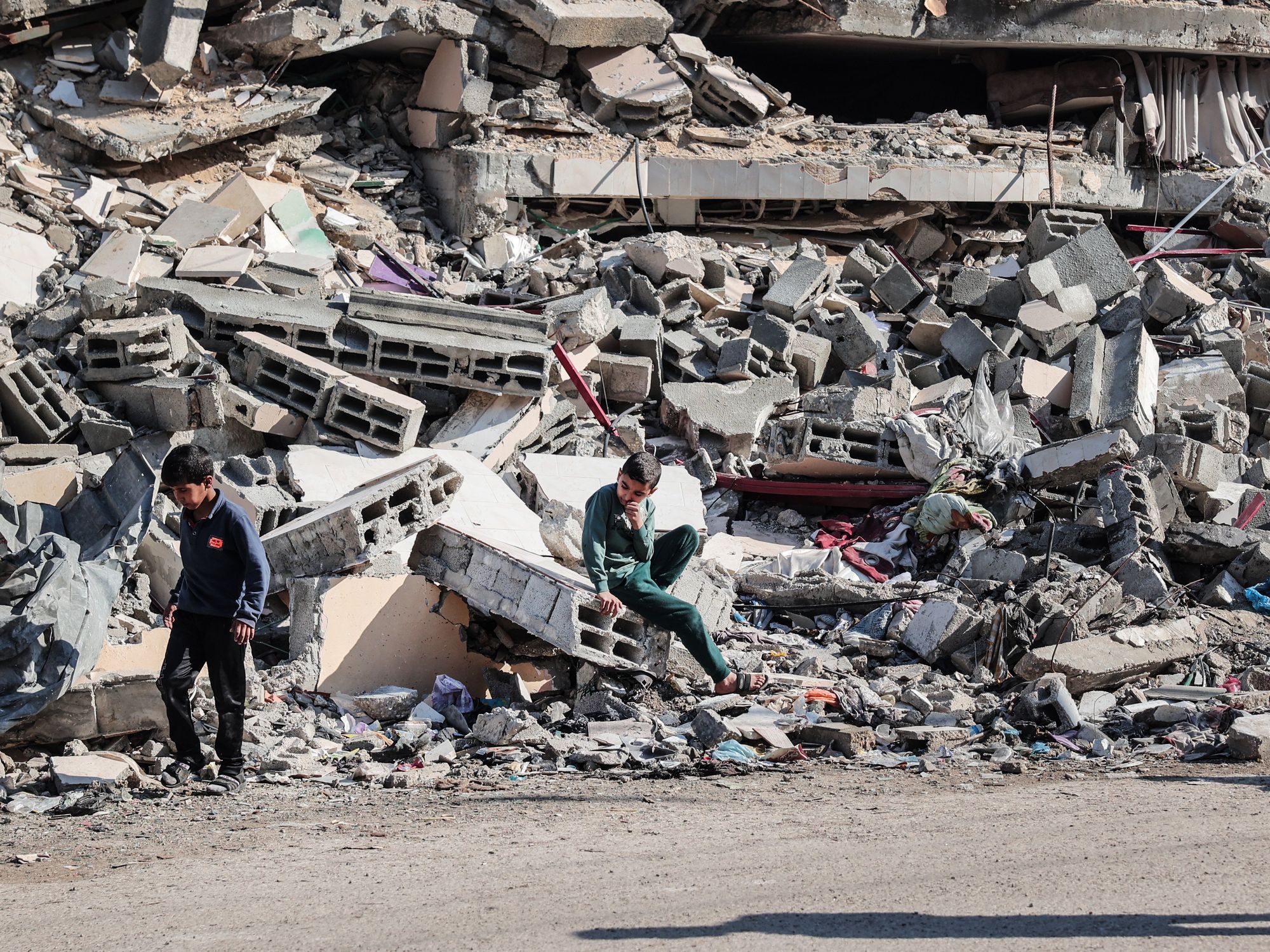 Photo of Palestinian children amid the rubble in Rafah, southern Gaza, on Dec. 19