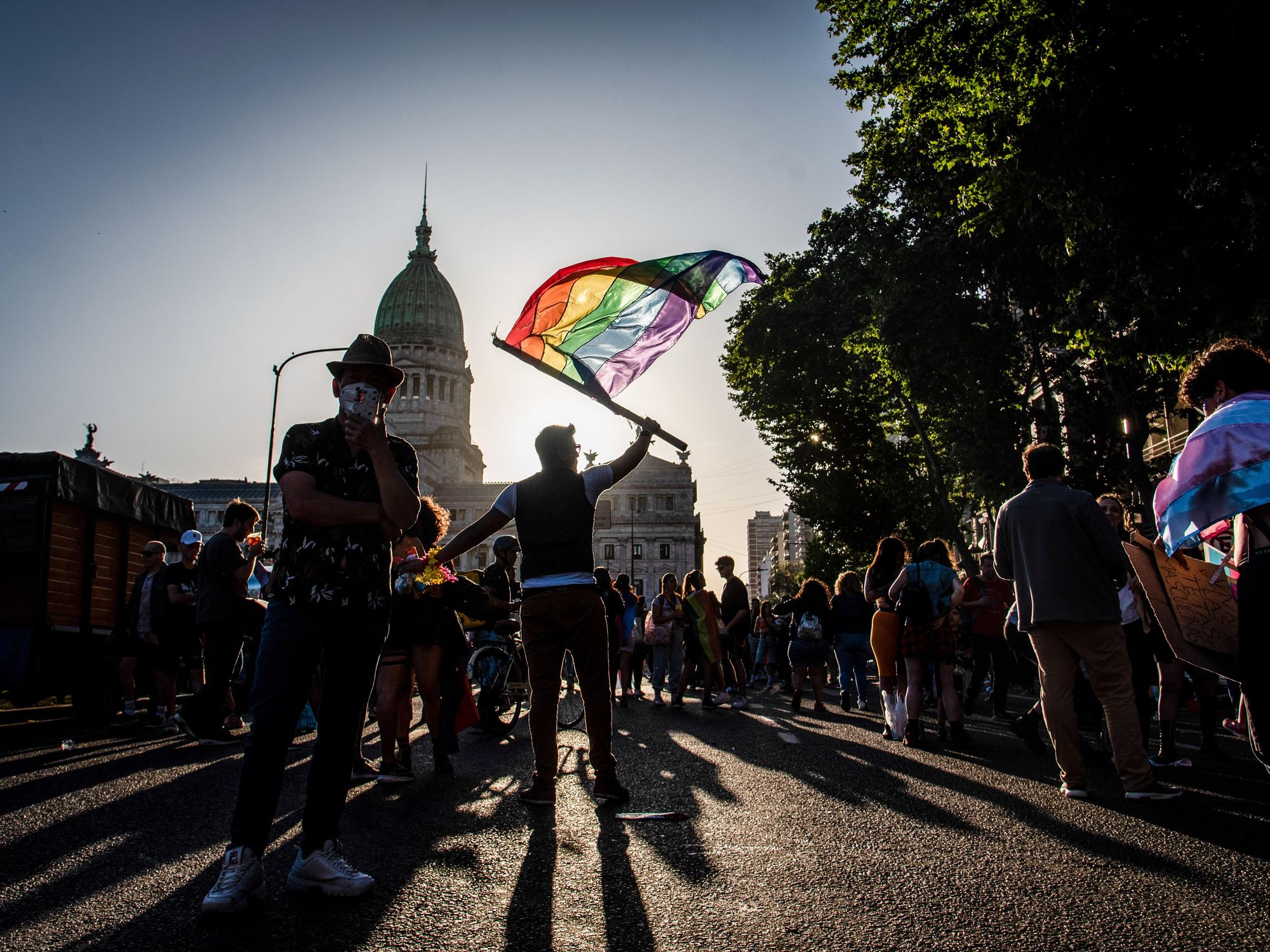 Photo of participants flying a rainbow flag at the Buenos Aires Pride on Nov. 5