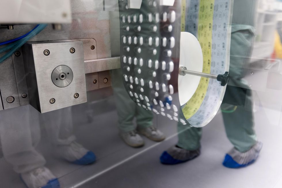 Photo of Paxlovid tablets being produced
