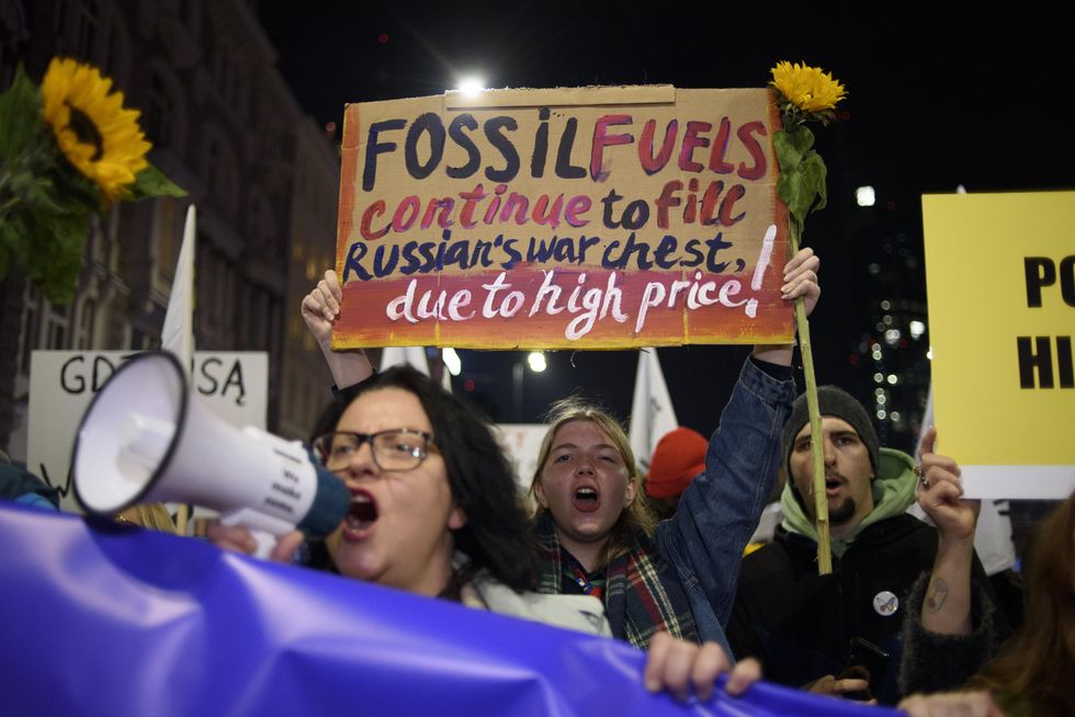 Photo of people at a rally against climate crisis in Warsaw