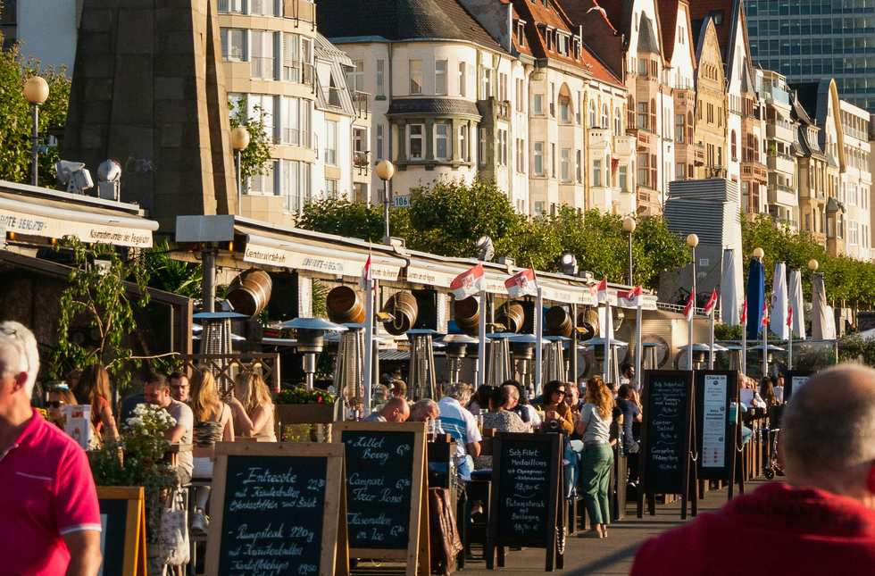 Photo of people at tables of restaurants in Düsseldorf, Germany