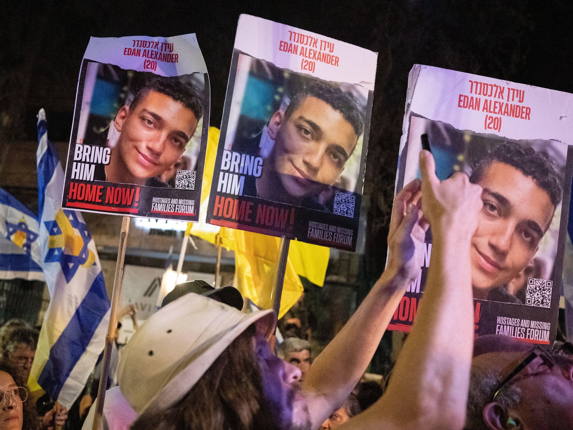 Photo of people attending a protest calling for the release f Israeli hostages held in Gaza, in Jerusalem.