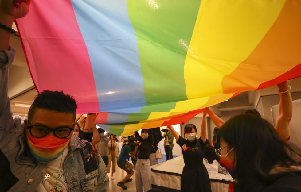 Photo of people flying rainbow flag at the 2021 Hong Kong Pride Parade
