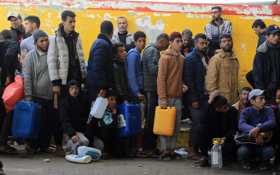 Photo of people lining up to try and get fuel in Khan Younis, Gaza