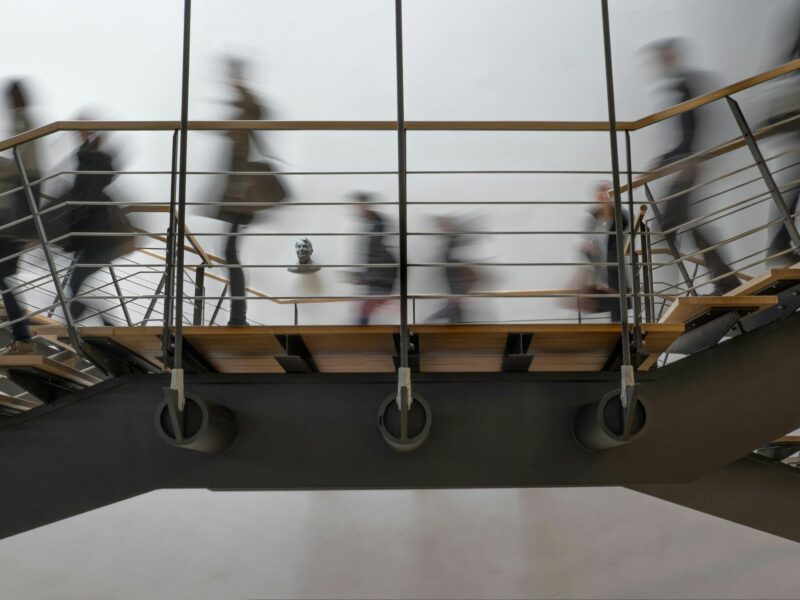 Photo of people passing by on a bridge in Stuttgart Germany