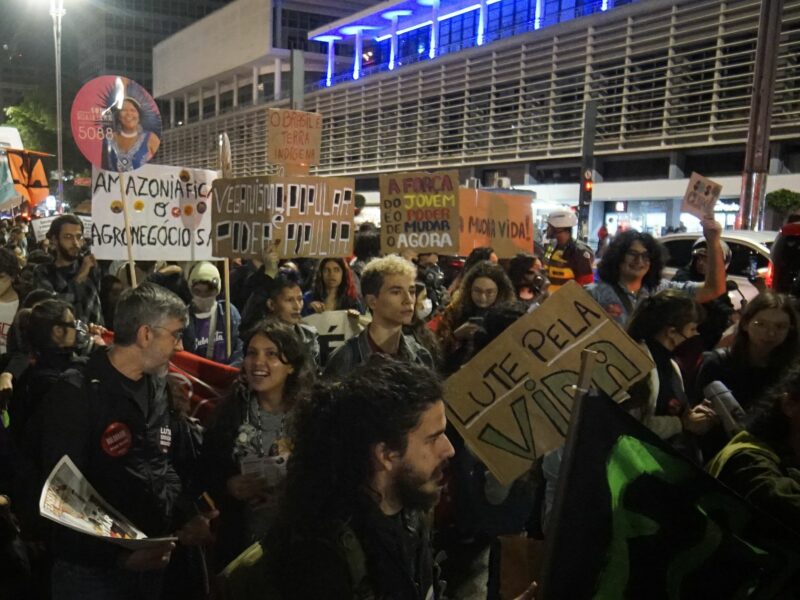 Photo of people protesting in Brazil demanding urgent action against global warming