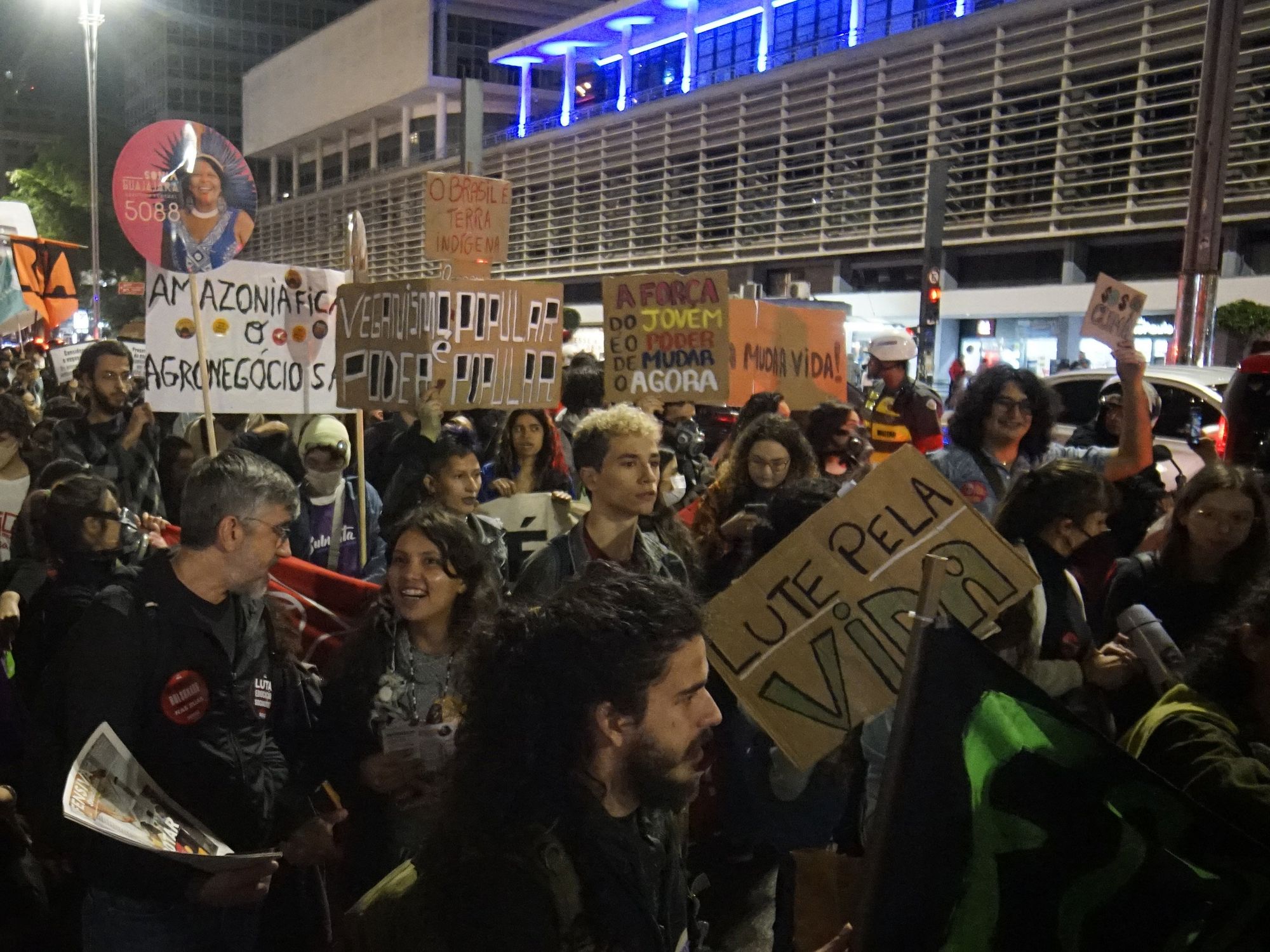 Photo of people protesting in Brazil demanding urgent action against global warming