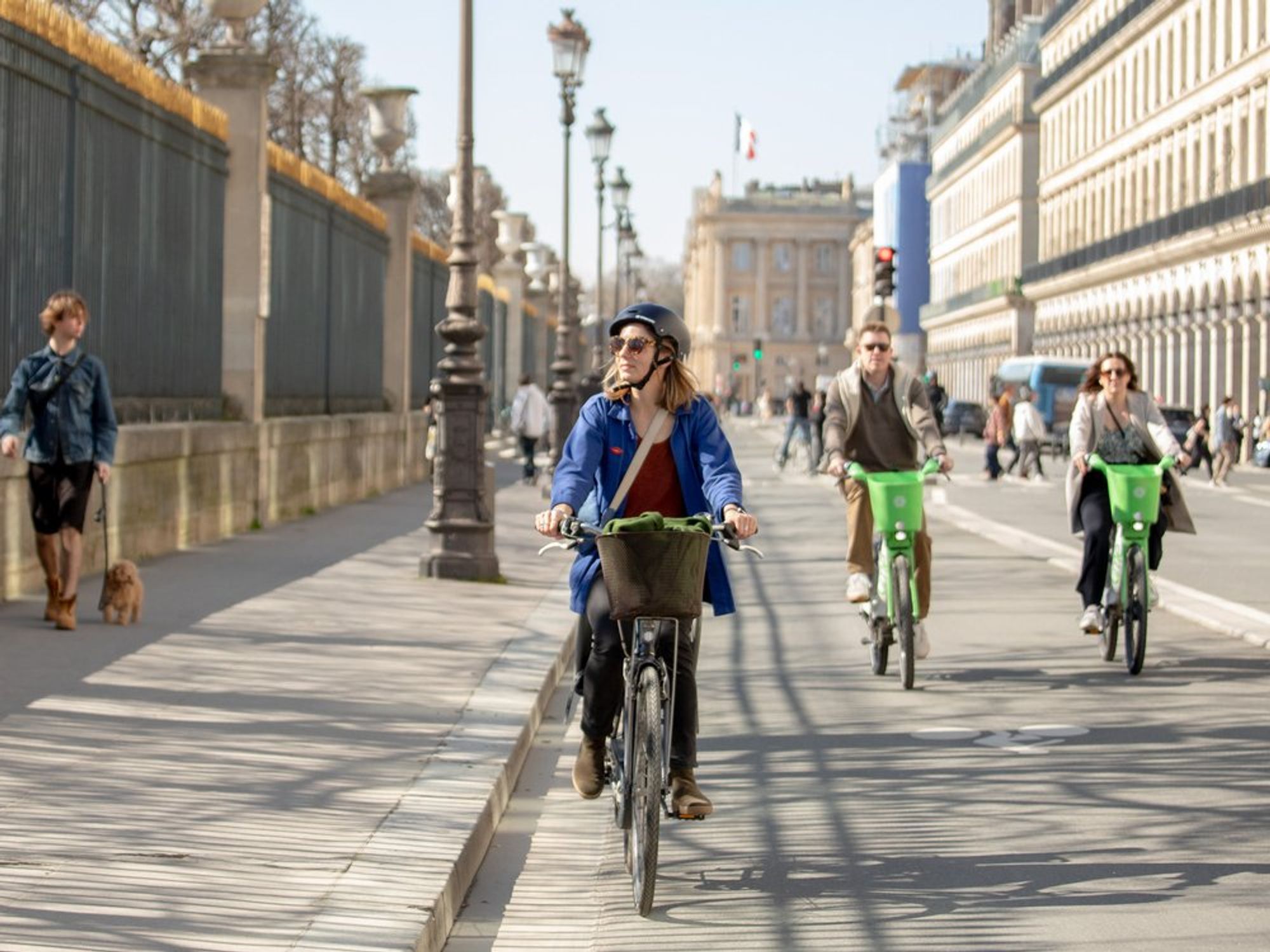 Photo of people riding bicyles in paris
