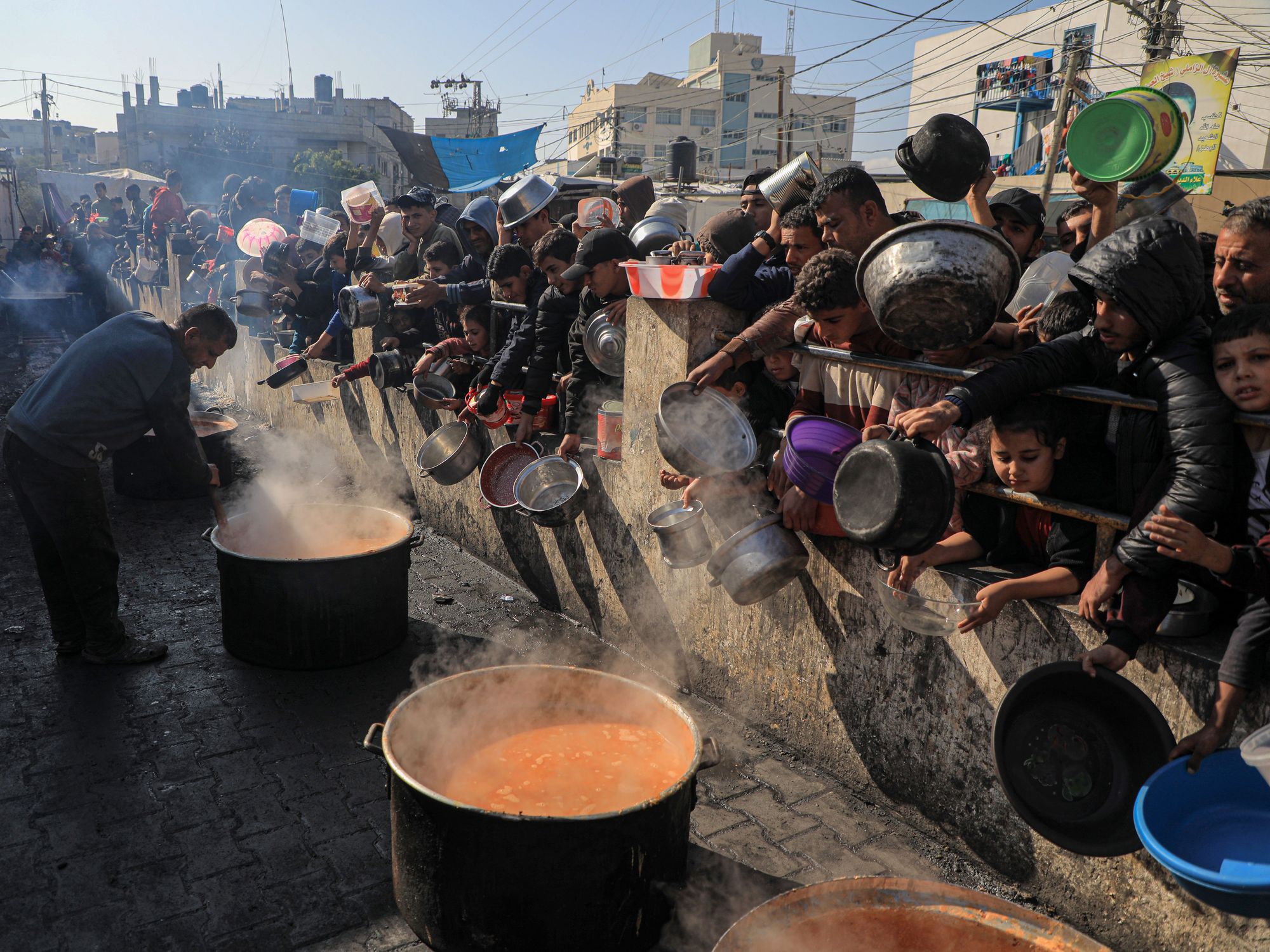 Photo of people waiting for food in the city of Rafah, Gaza