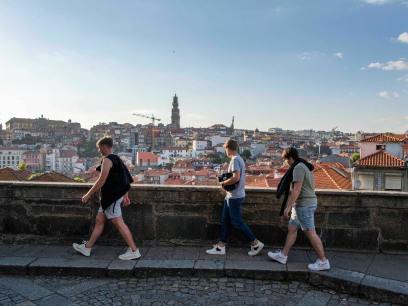 Photo of people walking near the cathedral in Porto