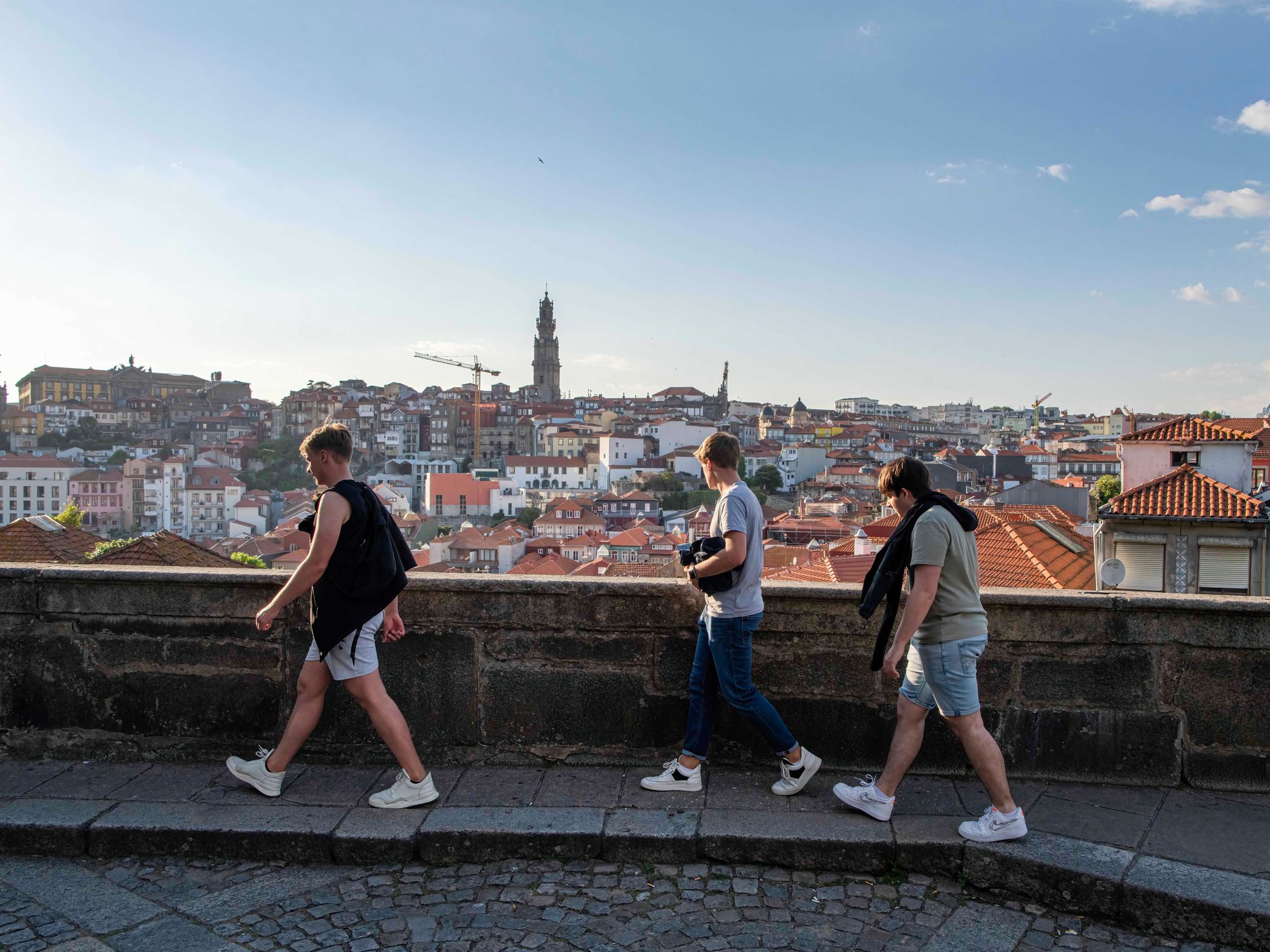 Photo of people walking near the cathedral in Porto