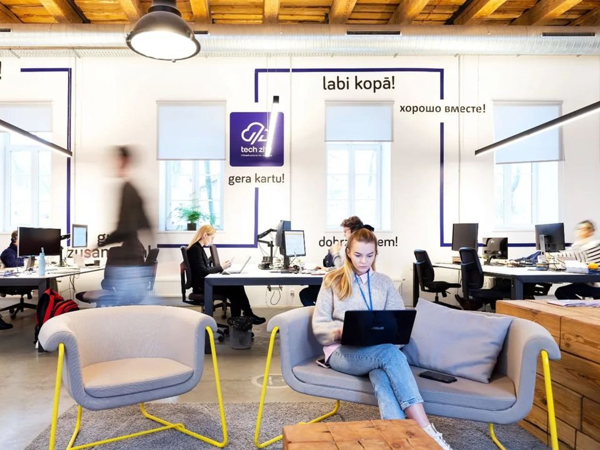 Photo of people working on computers at a tech incubator in Vilnius
