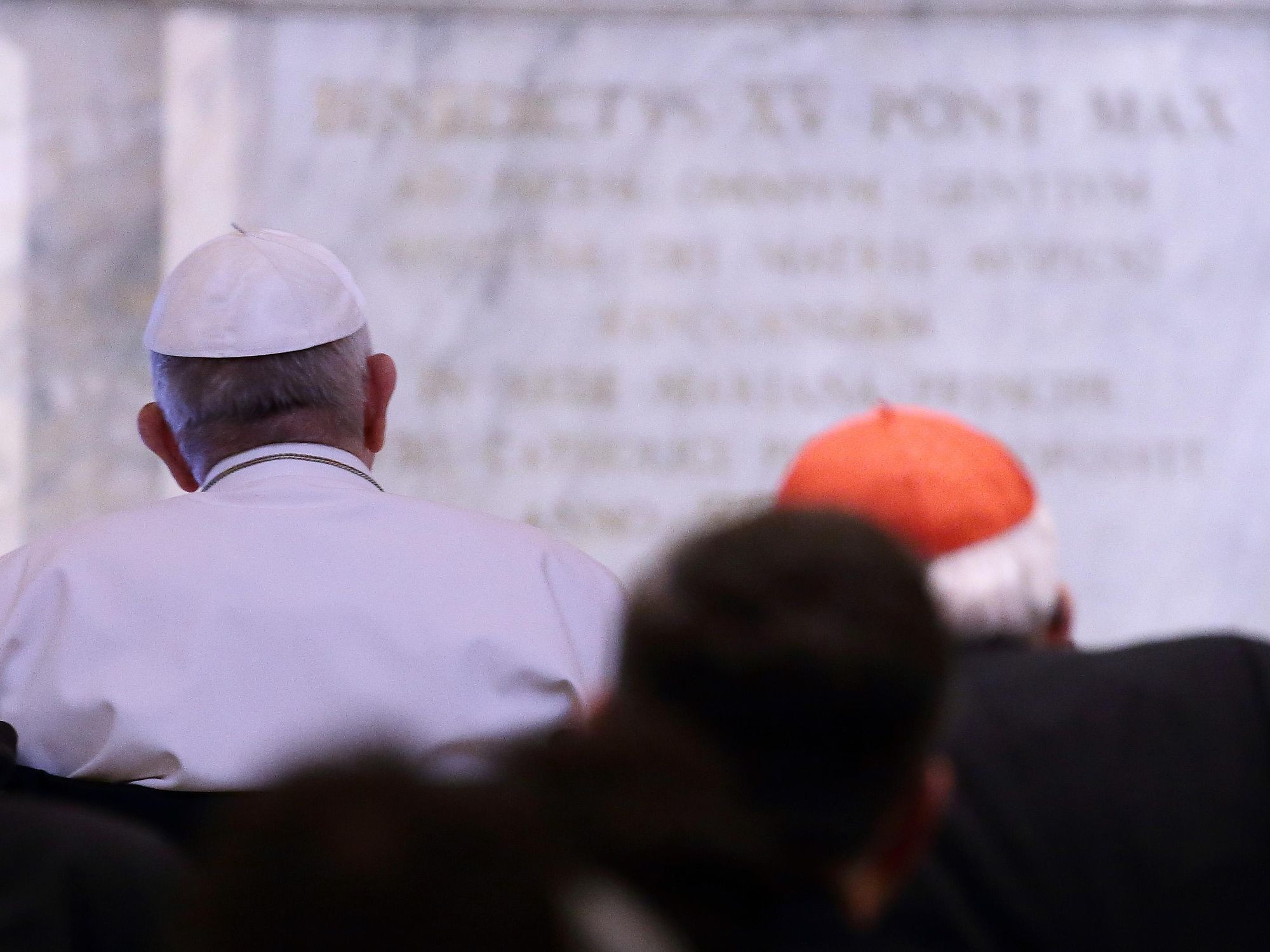 Photo of Pope Francis sitting in church in Rome