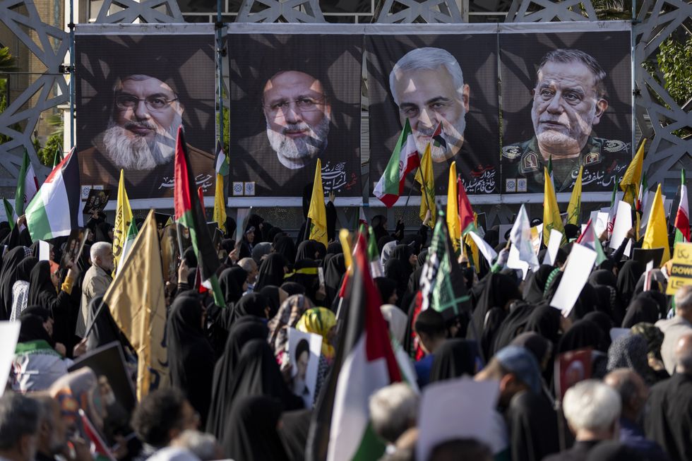 Photo of protesters carrying a portrait of slain Hezbollah leader Hassan Nasrallah at a rally in Tehran on Oct. 2.