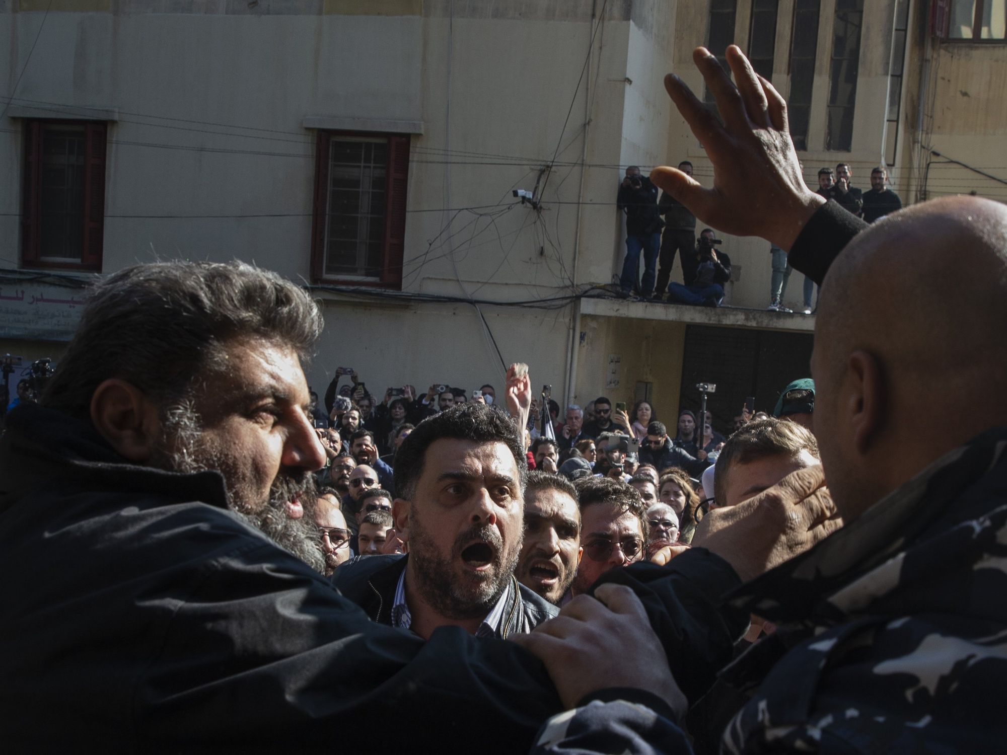 Photo of protesters during a rally organized by family members of victims killed in the 2020 blast in Beirut port, in front of the Justice Palace earlier this year.
