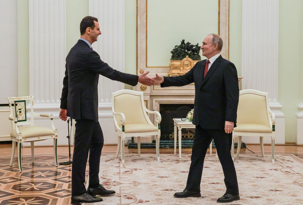 photo of putin and assad