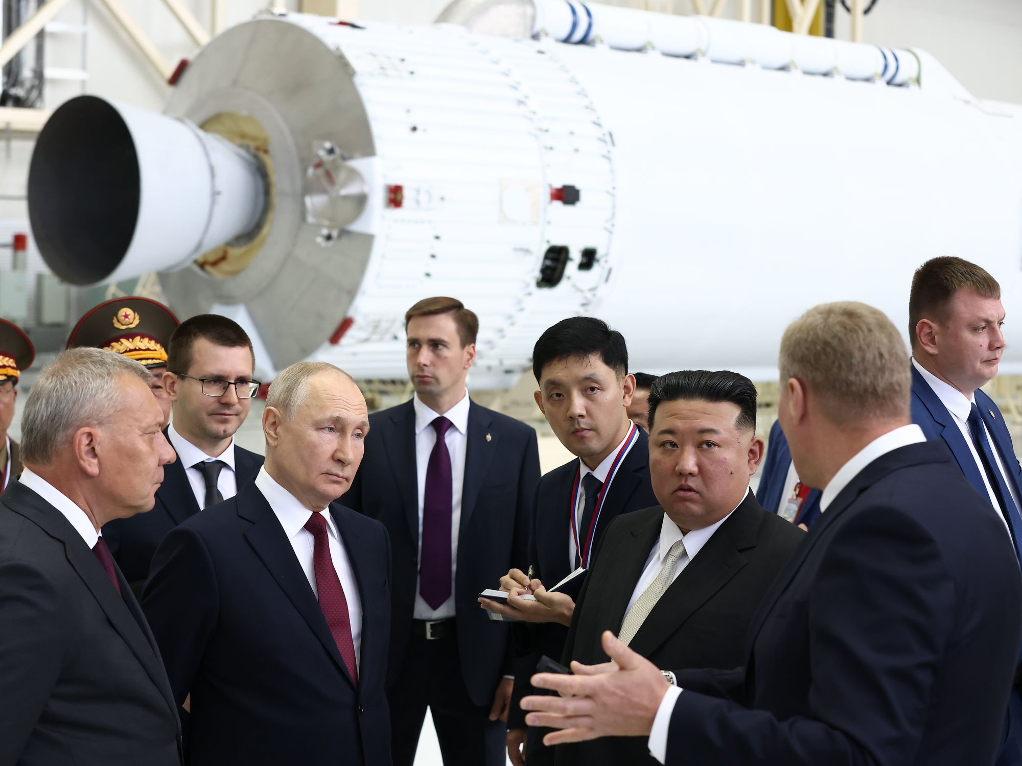 photo of putin and kim jong-un at a space center