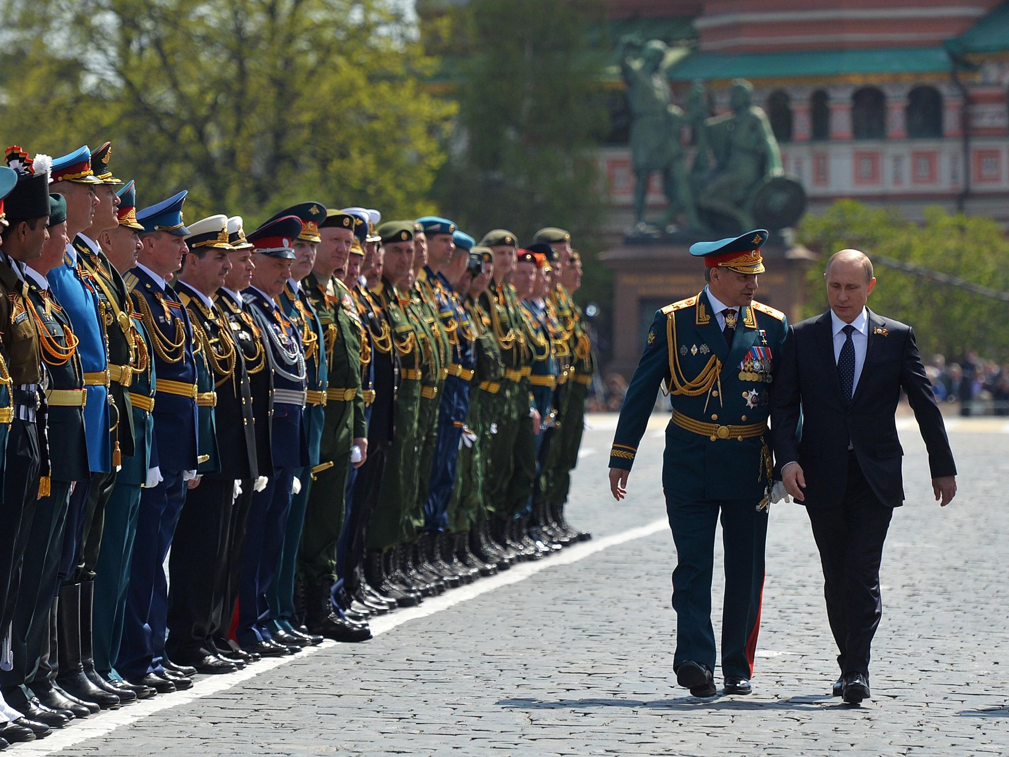 photo of putin and military in red square in moscow