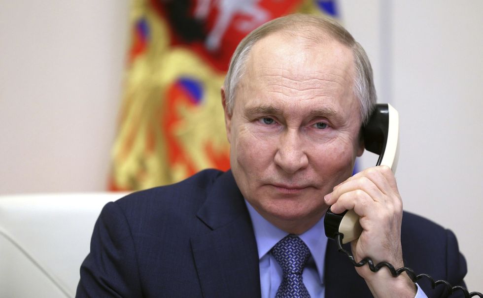 photo of Putin on the phone