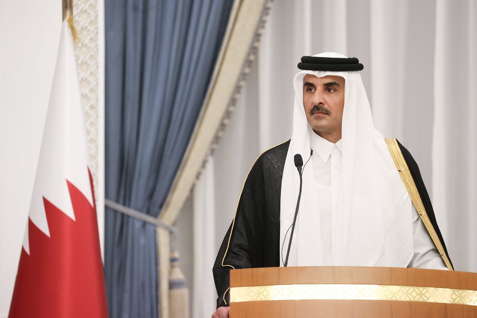 Photo of Qatar's Emir Sheikh Tamim bin Hamad Al Thani at a press conference in Doha on Oct. 2.
